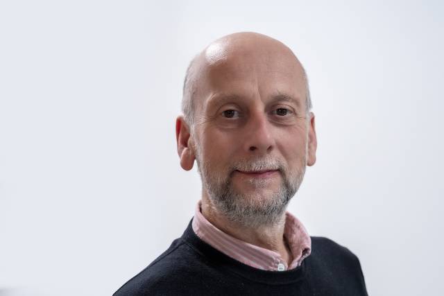 A portrait style photograph of Philip Leicester